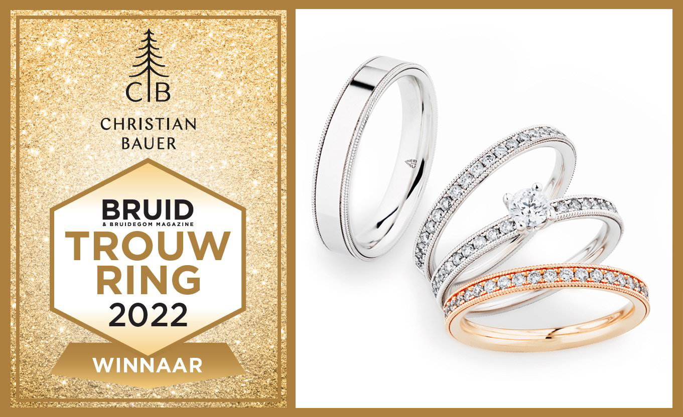 Trouwringen van het jaar verkiezing winnaar Christian Bauwer. Afbeeldinhg met award en de gewonnen ringen set.