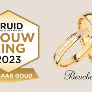 Winnende trouwringen van de Trouwring van het Jaar verkiezing 2023. Twee gouden ringen met op de damesring 15 diamantjes.