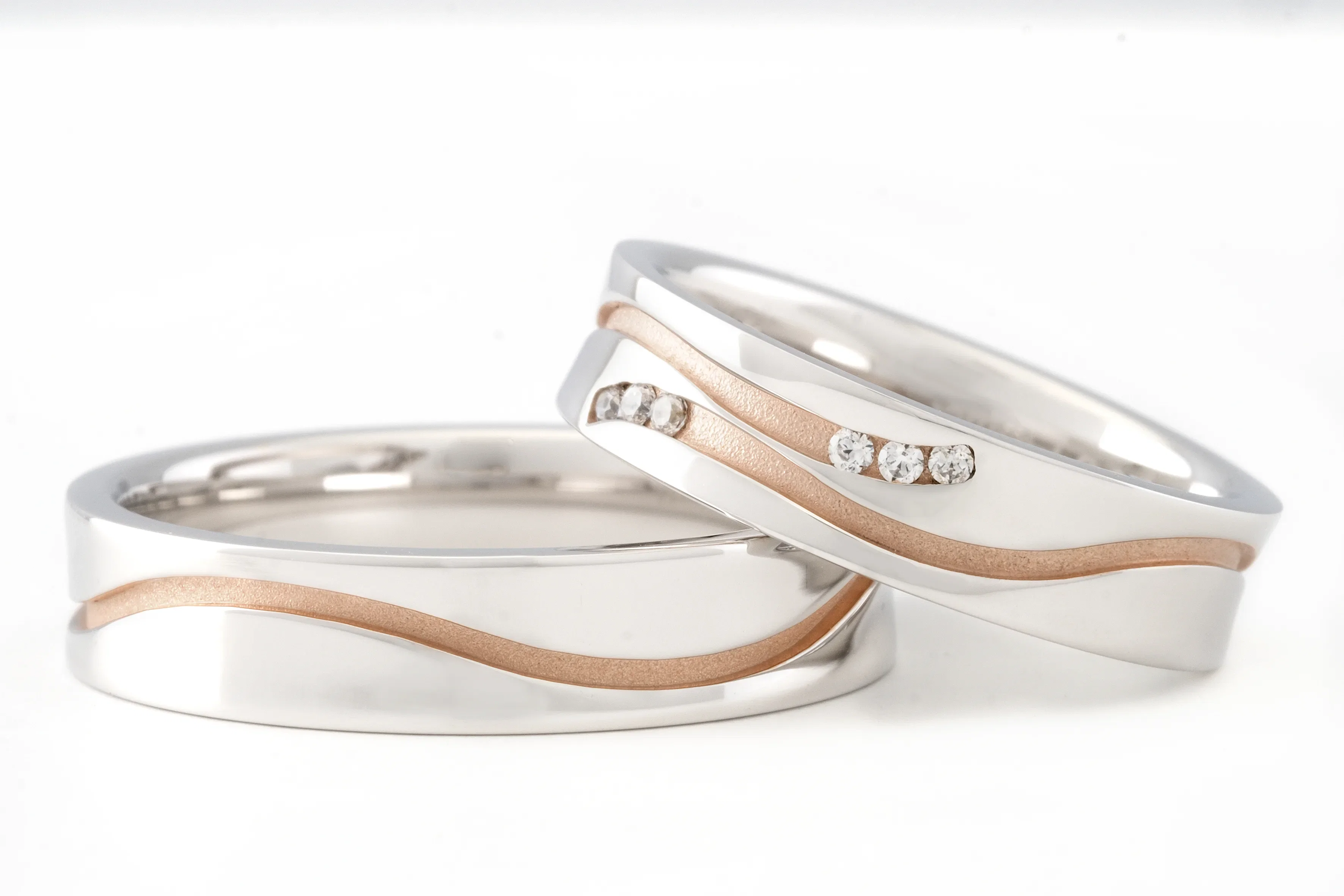 Zilver en rosé trouwring